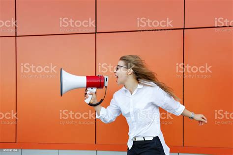 Girl Activist Yelling At Loudspeaker Stock Photo Download Image Now