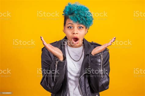 Young Modern Brunette Girl With Curly Blue Hair Of Afro American