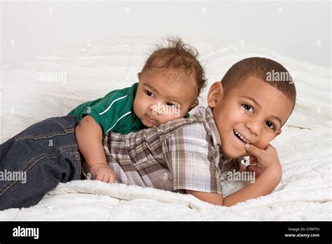 Two Multiethnic Boys Brothers Of Mixed Race One 3 Months Old And