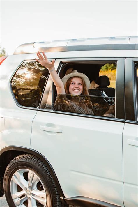 Man Stick Out Hand From Car Window Relaxed Enjoying At Sunset Stock