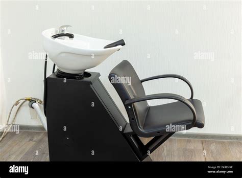 Professional White Wash Basin In The Interior Of A Beauty Salon