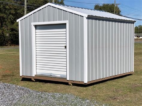 My main concern was maintaining good cross ventilation down to floor level for such things as welding. Utility Shed with Roll-up Door | Hometown Sheds, Gastonia ...