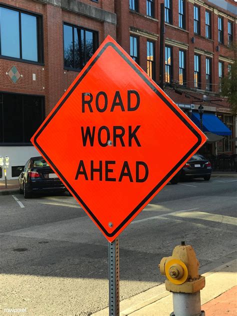 Road Work Ahead Construction Sign On The Street Free Image By