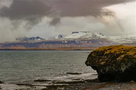 Typical Icelandic Sunrise Sunset Cliff Landscape At Arnarstapi Area In
