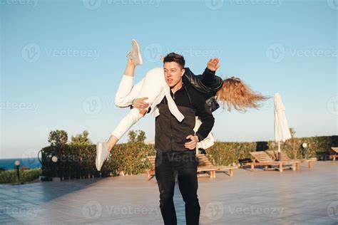 Happy Couple Man Carrying Woman 11342591 Stock Photo At Vecteezy