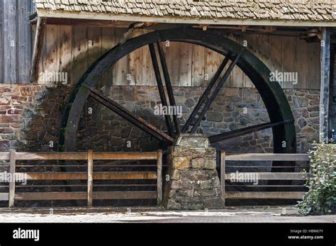 Wooden Wheel Of Water Mill Stock Photo Alamy