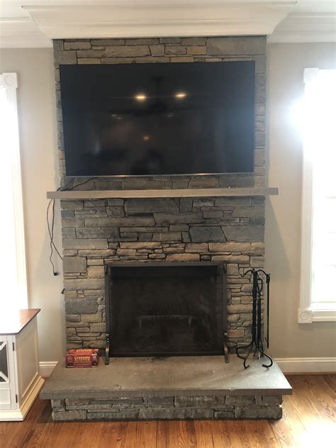 75” Tv Mounted Above Stone Fireplace Tv Mounted Above Fireplace