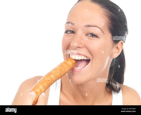 Young Woman Eating Sausage Model Released Stock Photo Alamy