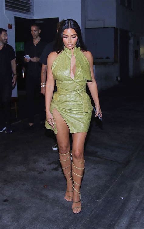 Kim Kardashian Sizzles In A Gold Mini Dress Then A White Crop Top