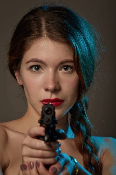 10000 Woman Aiming Gun Stock Photos Pictures And Royalty Free Images
