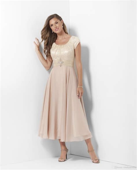 The feature of tea length wedding dress is a skirt that falls below the knee and above the ankle. Champagne Tea Length Long Modest Bridesmaid Dresses With ...
