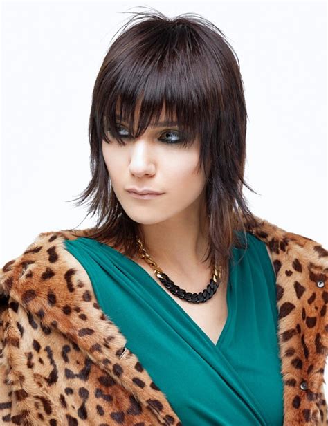 There are a lot many hairstyles which can make the short hair look trendy and fashionable. Medium length wash and wear hairstyle with layers and bangs