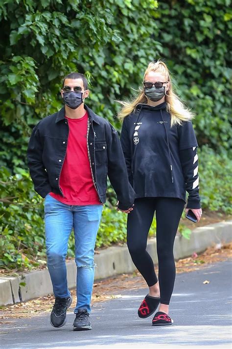 Sophie Turner Shows Her Growing Baby Bump As She Steps Out For A Stroll