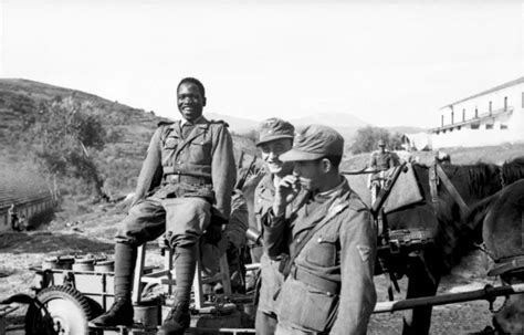 An Afro German Waffen Ss Soldier Of The Free Arabian Legion Having A