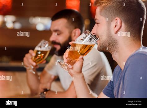 Two Men Drinking Beer Together Hi Res Stock Photography And Images Alamy