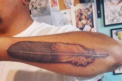 15 Best Eagle Feather Tattoo Designs And Ideas Petpress Eagle