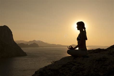 Yoga Pose Silhouette At Sunrise Stock Photo Image Of Pose Rock 34308350