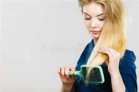 Woman Brushing Her Long Hair With Brush Stock Image Image Of Glossy