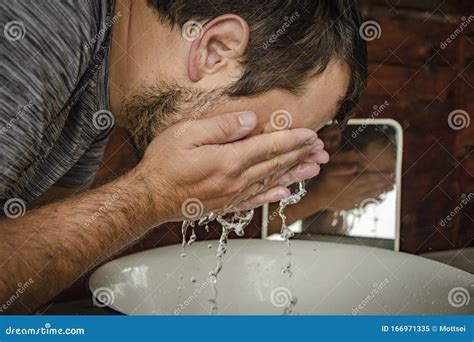Man Washing His Face Over A Washing Pan Stock Image Image Of Hands