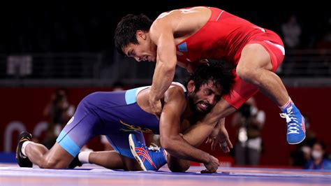 Wrestling For Gold The History And Techniques Of Olympic Wrestling