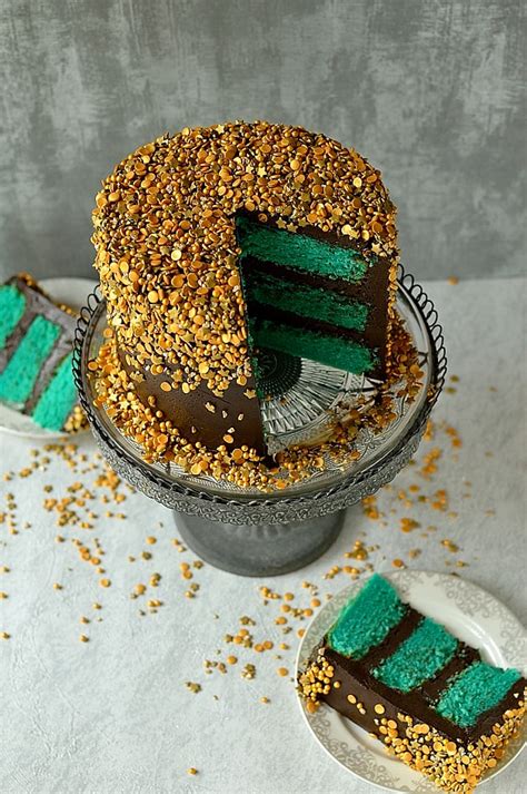 Then, hold the cake with 2 hands and gently roll it in the sprinkles to stick them to the sides. Chocolate & Vanilla Gold Sprinkles Cake - Domestic Gothess