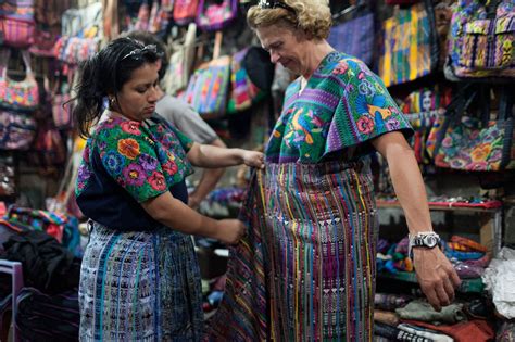Traditional Guatemalan Clothing Demonstration In Antigua Choosing Figs