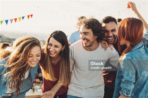Ecstatic Group Enjoying The Party Stock Photo Download Image Now