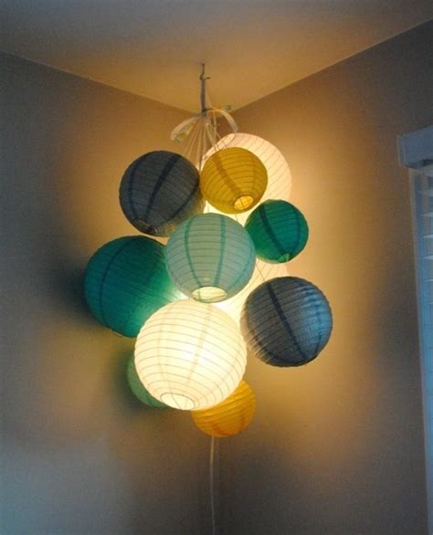 It's always sad to see folks pulling down their christmas lights after the holidays have come and the paper lanterns give the lights a pretty muted effect, so the string lights can be draped around a headboard without blinding you or guests! 45 Easy DIY Paper lantern and lamps ideas | Paper lanterns ...