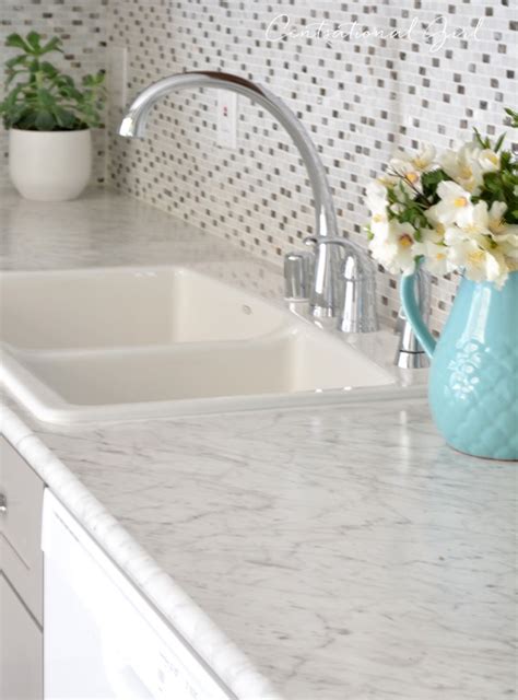 You may be surprised to learn that modern plastic laminate countertops can withstand high temperatures; Gray + White Kitchen Remodel | Centsational Style