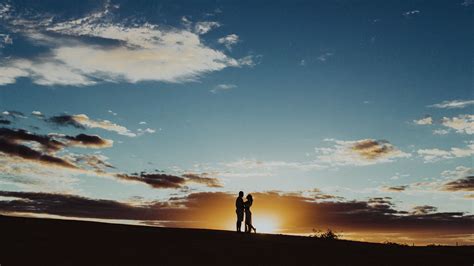 Download Wallpaper 1920x1080 Silhouettes Pair Sunset Hugs Romance