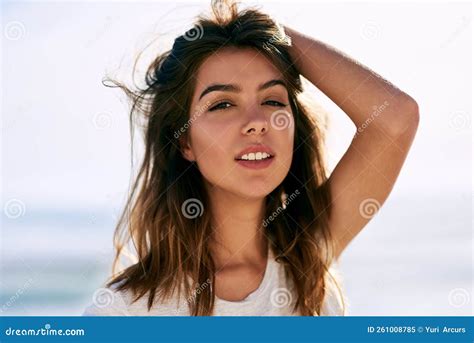 Beach Hair Is The Best Hair A Beautiful Young Woman Posing On The