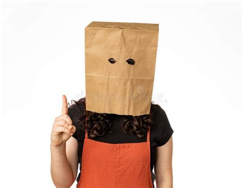 Young Woman Wearing Paper Bag Over Her Head Holding One Finger Up Stock Image Image Of Concept