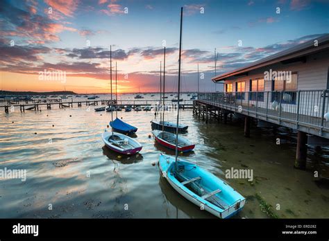 Boats At High Tide At Sandbanks In Poole Harbour In Dorset Stock Photo