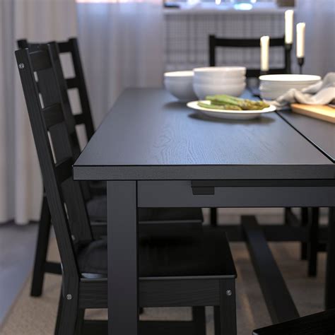 Dining tables are the heroes of the home. IKEA NORDVIKEN Black Extendable table | Table, Ikea ...