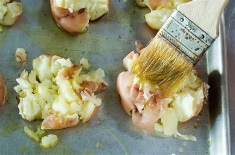 Place potatoes on baking sheet and lightly smash with a fork, the heel of your hand or a potato masher. Crash Hot Potatoes | Recipe