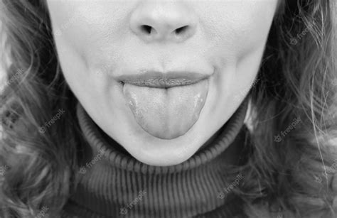 Premium Photo Sticking Her Tongue Out Woman Cropped View Stick Clean Tongue Out Of Mouth