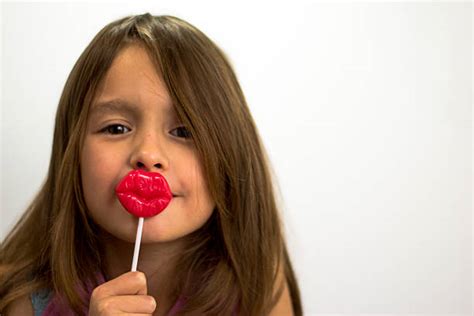 Kissing Child Lipstick Kiss Little Girls Pictures Images And Stock