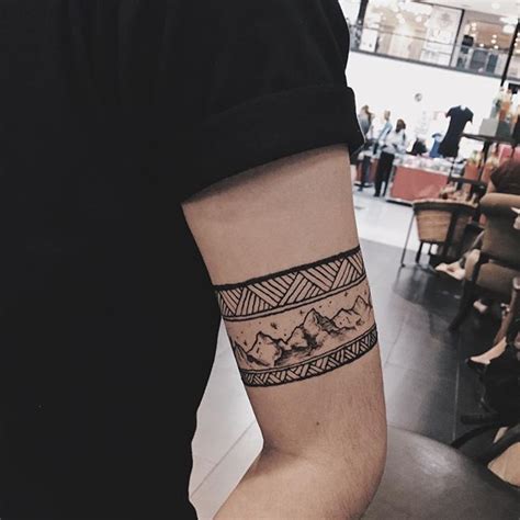 Wrap Around Arm Tattoo
