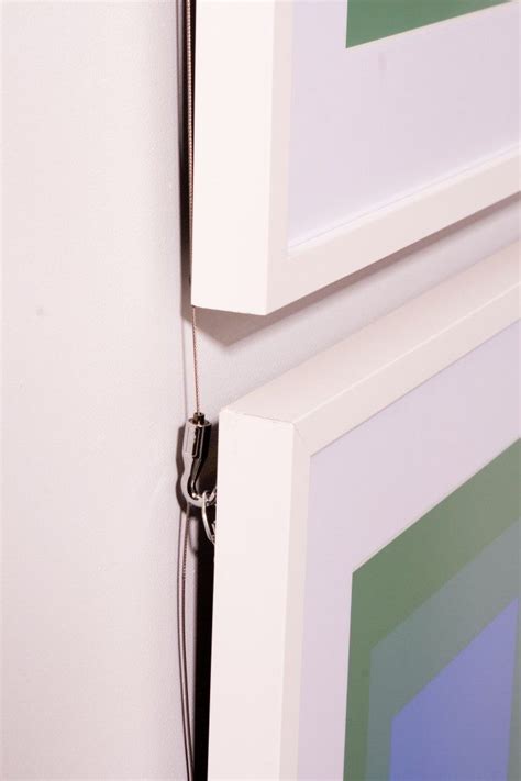 How To Choose The Right Picture Hanging Hardware Ilevel