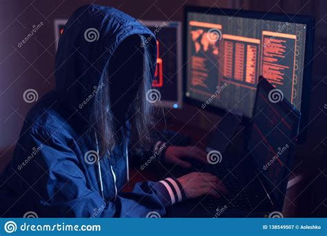 Hacker Girl Using A Dangerous Malware Royalty Free Stock Photo