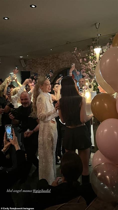Emily Ratajkowski Oozes Sex Appeal In A Clingy Neon Orange Dress At Gigi Hadid S Birthday Party