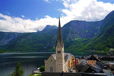 The Spire Of Hallstatt Lutheran Church With The Lake And T Flickr