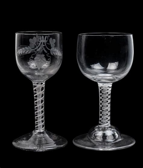 georgian double twist stem wine glasses with engravings british georgian glass