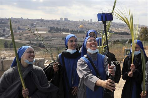 Christians Mark Palm Sunday In Jerusalem Bethlehem As Covid