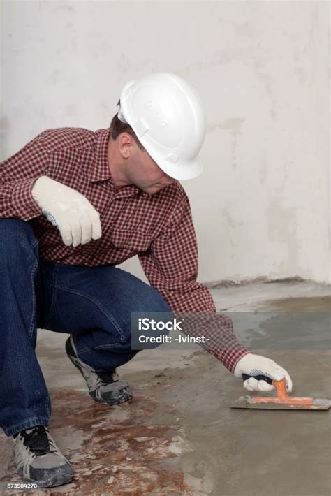 Construction Worker Spreading Concrete Stock Photo Download Image Now