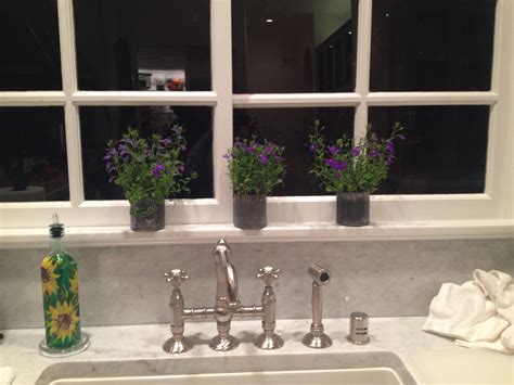 A mirror can be a great asset when you're redecorating. Lobelia on mom's windowsill. | Window sill, Lighted ...