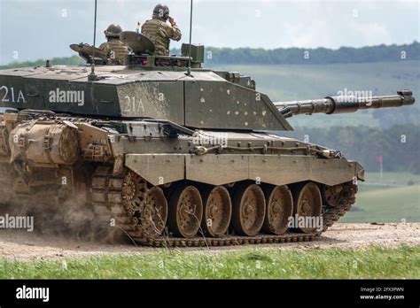 A British Army Challenger 2 Main Battle Tank In Action In A