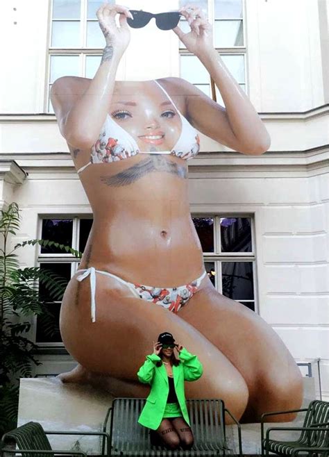rihanna visits her own statue at the berlin biennale