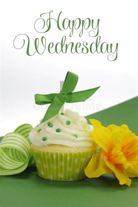 Beautiful Green Decorated Cupcake With Daffodil And Stripe Ribbon On Green Background With Happy