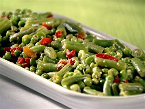 Loti symbiosis, inoculation with singlestrain or multistrain inoculants did not cause a differential plant response, as is evident from the shoot, nodule. Garlicky Green Beans and Peas Recipe | Sandra Lee | Food ...